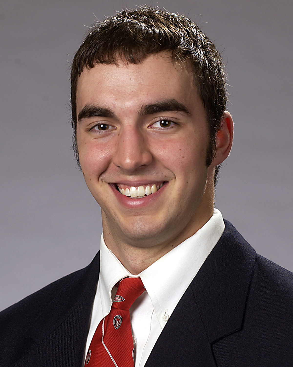 ϲ head football coach Sean Lewis attended the University of Wisconsin-Madison and played for the Badgers football team. (Photo provided by Sean Lewis)