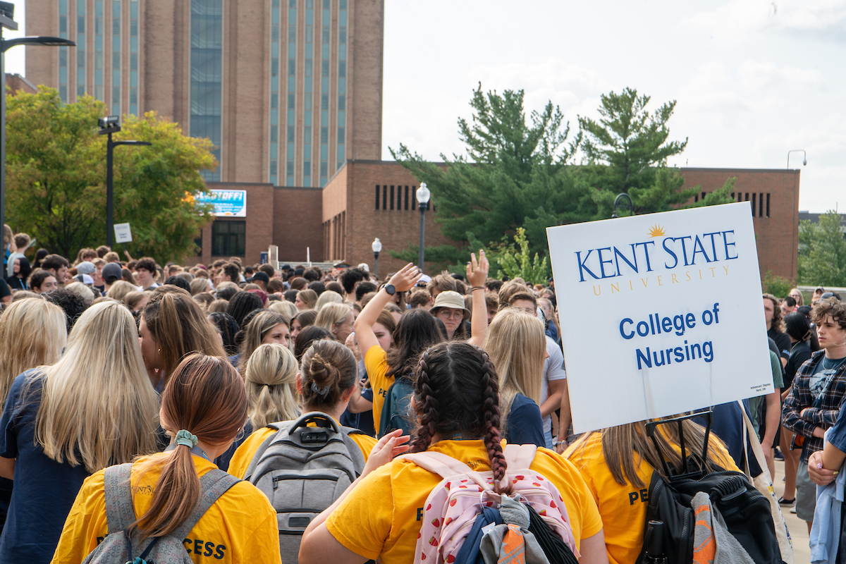 New Kent State University students make their way to the Memorial Athletic and Convocation Center for 2023 Convocation.