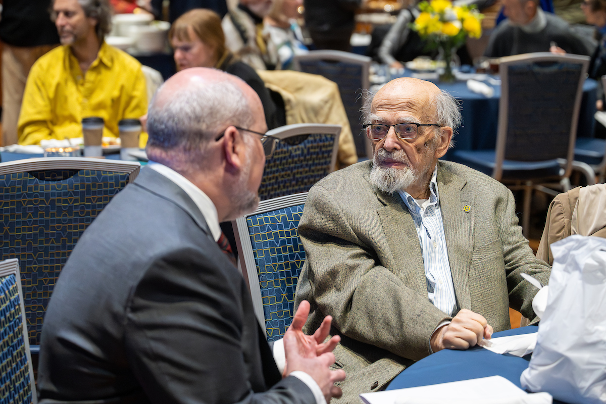 Professor Emeritus Jerry M. Lewis speaks with Kenneth Burhanna, dean of University Libraries, at the May 4 lecture series that bears Lewis's name on May 3, 2023. Professor Emeritus Jerry M. Lewis speaks with Kenneth Burhanna, dean of University Libraries, at the May 4 lecture series that bears Lewis's name on May 3, 2023.