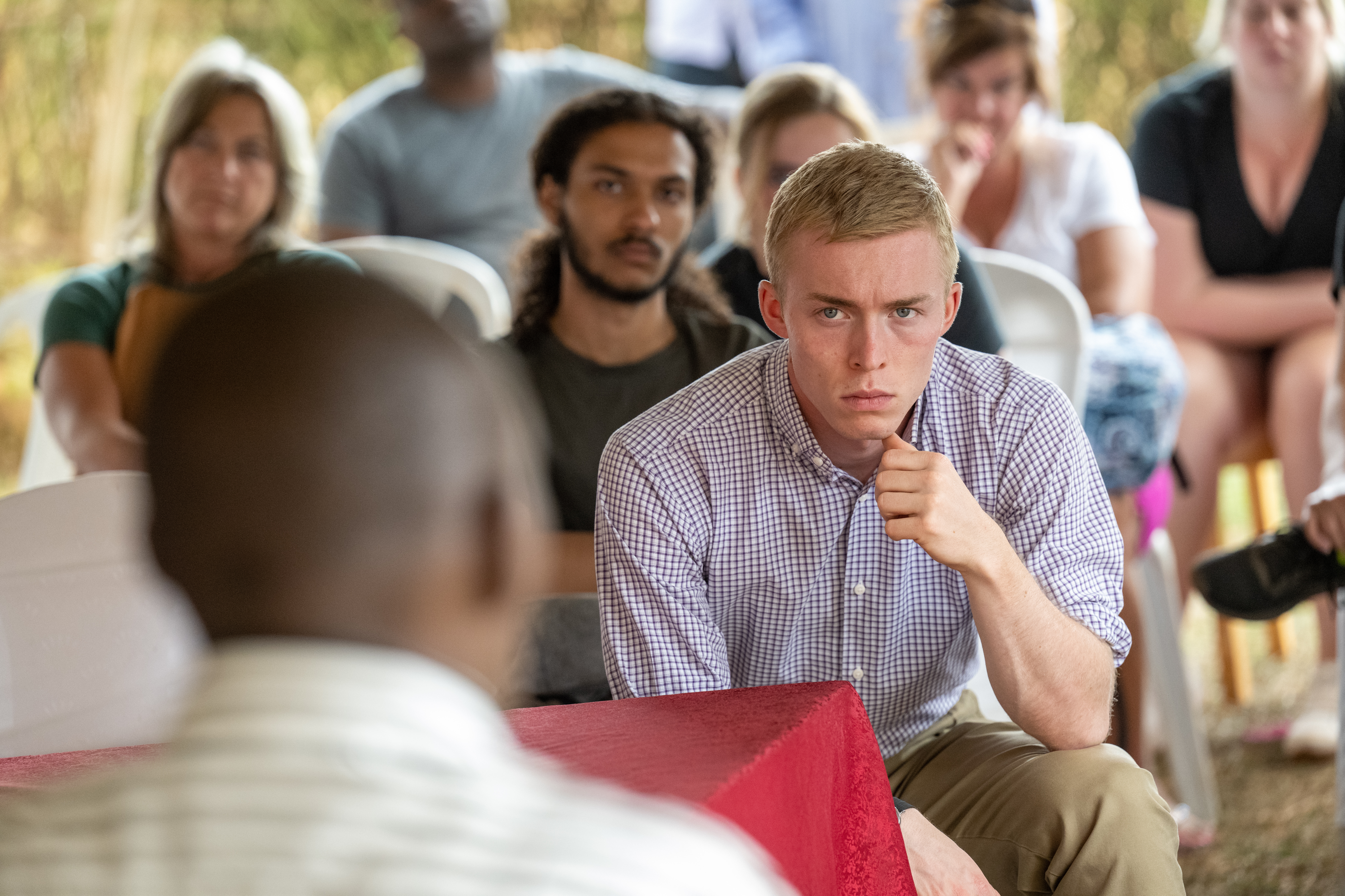 MŮ student Miles Listerman listens to discussions at a reconciliation village in Rwanda. MŮ student Miles Listerman listens to discussions at a reconciliation village in Rwanda.