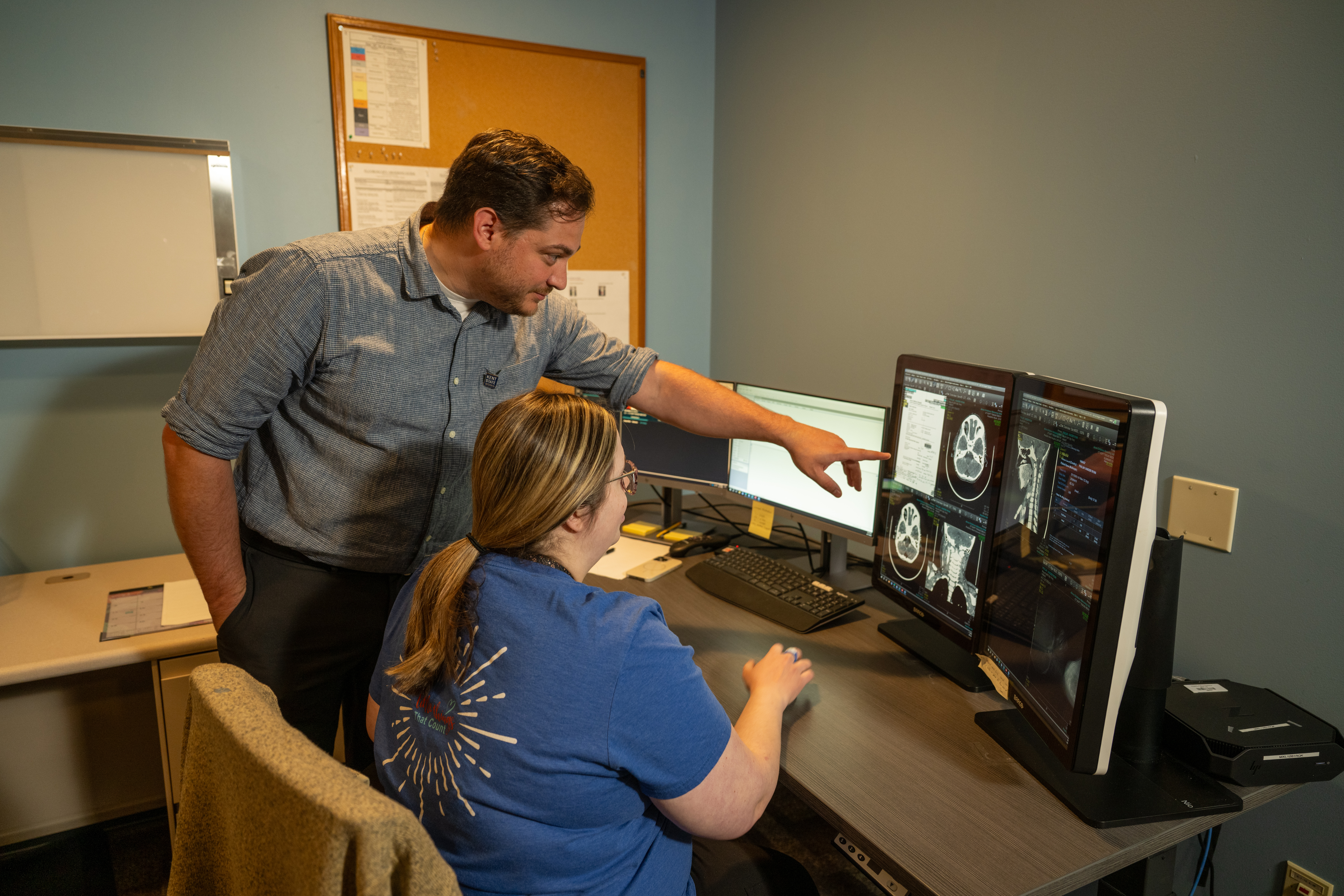 Ryan Pavlak looking at scans