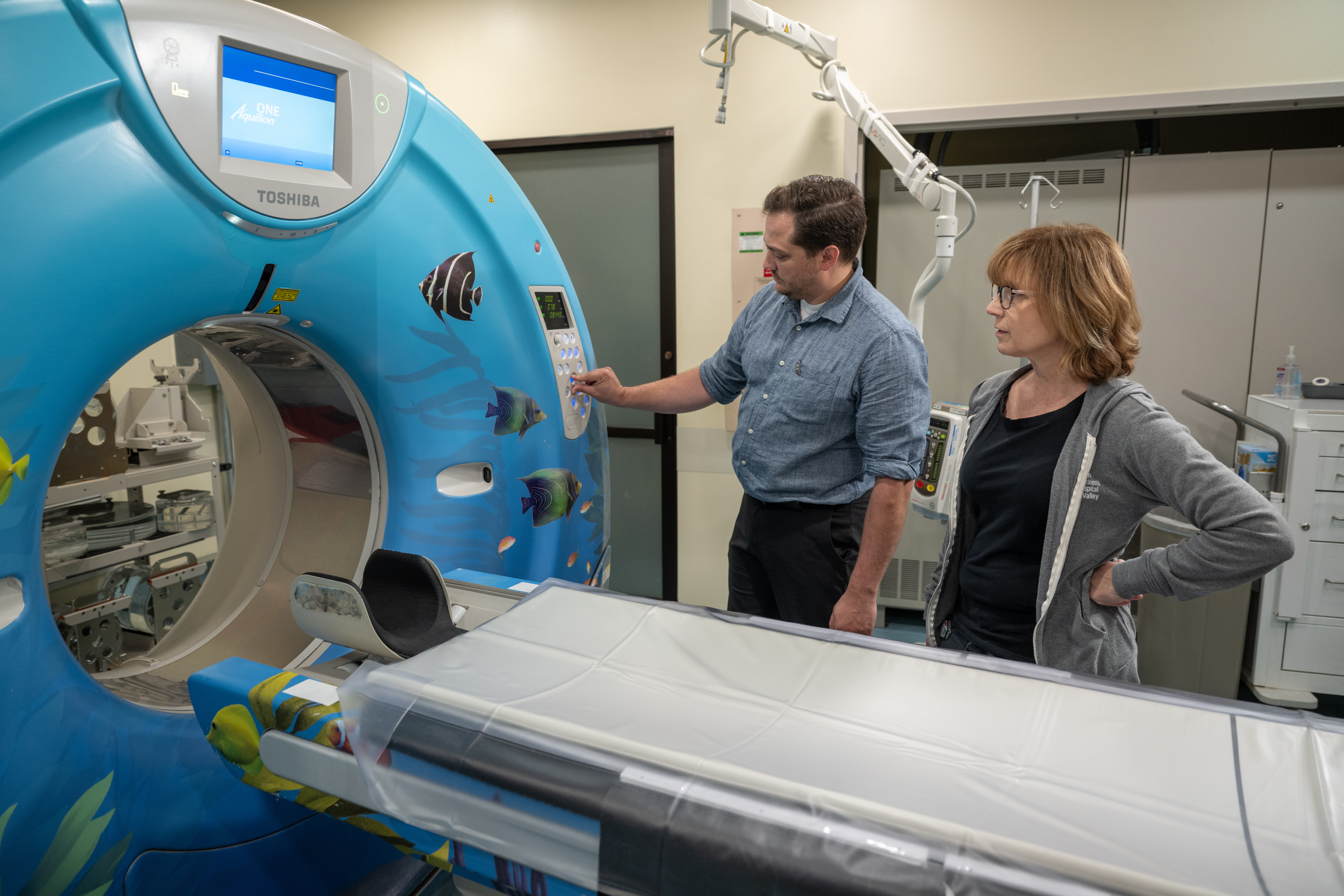 Ryan Pavlak working MRI machine