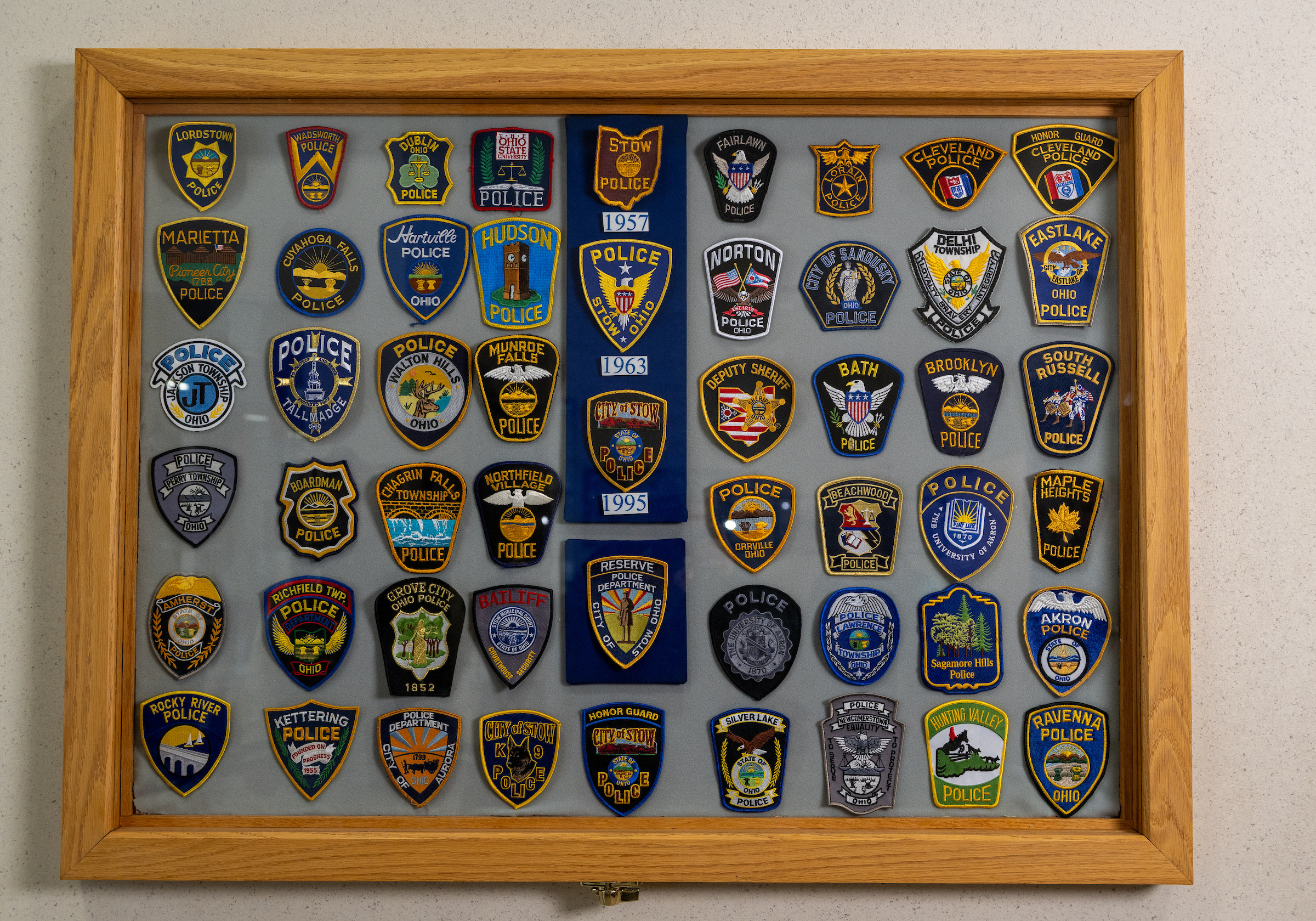 Showcase of police department patches from other cities