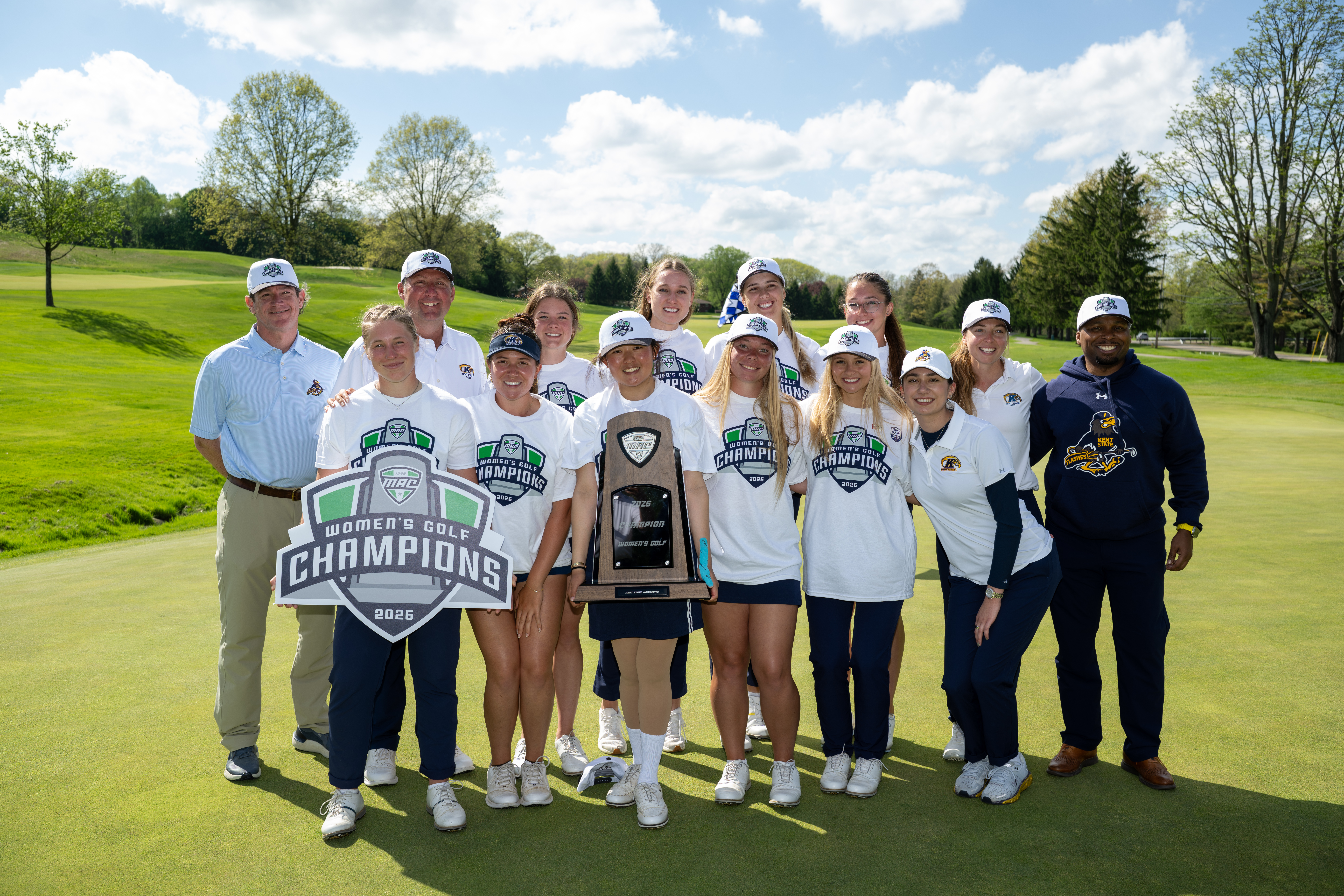 2026 Women's Golf Team holding up the MAC championship trophy