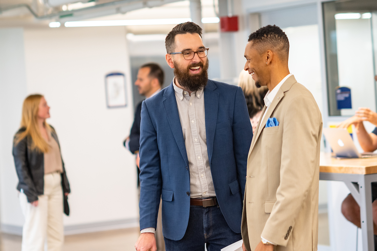 Zach Mikrut, director of Kent State LaunchNET, speaks with guests at the ribbon-cutting event. Zach Mikrut, director of Kent State LaunchNET, speaks with guests at the ribbon-cutting event.