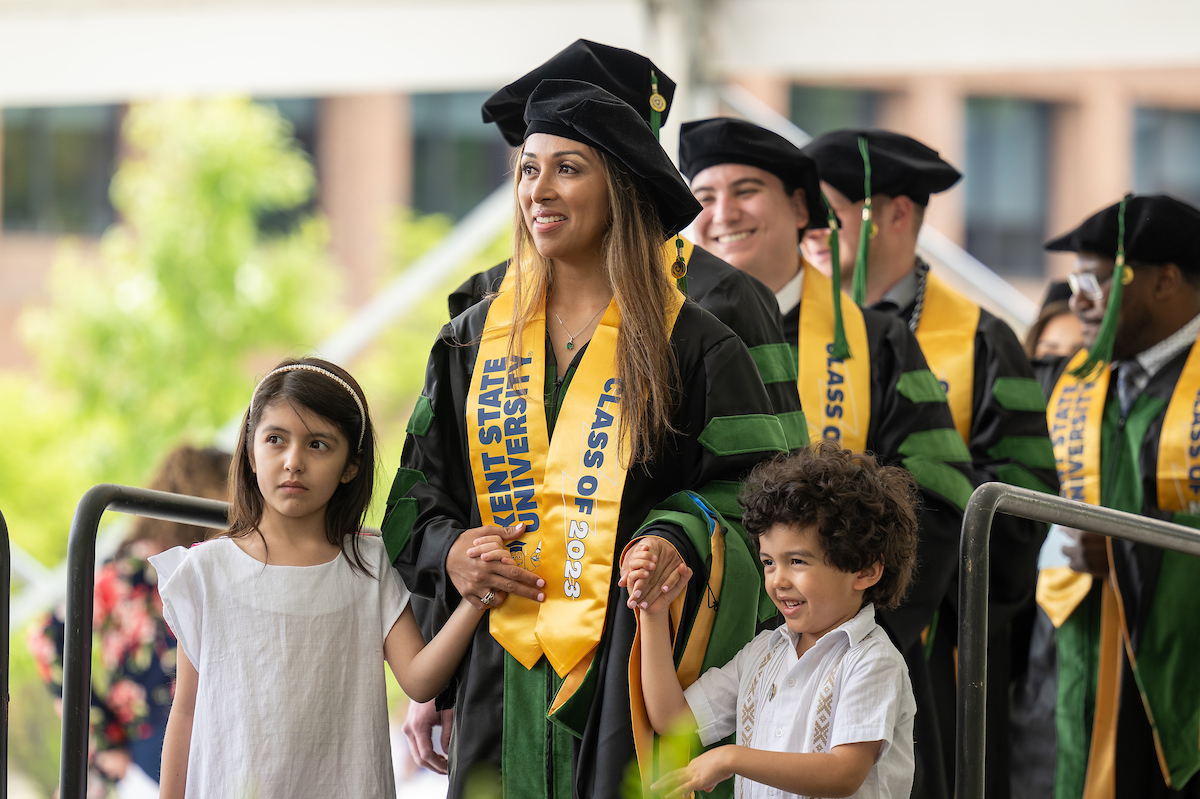 CPM 2023 graduate with children CPM 2023 graduate with children