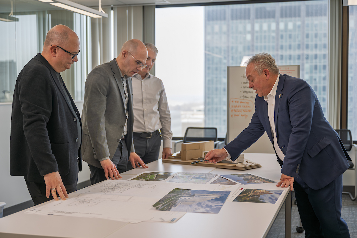 Sal Rini looking at designs with colleagues at the Perspectus office in Cleveland