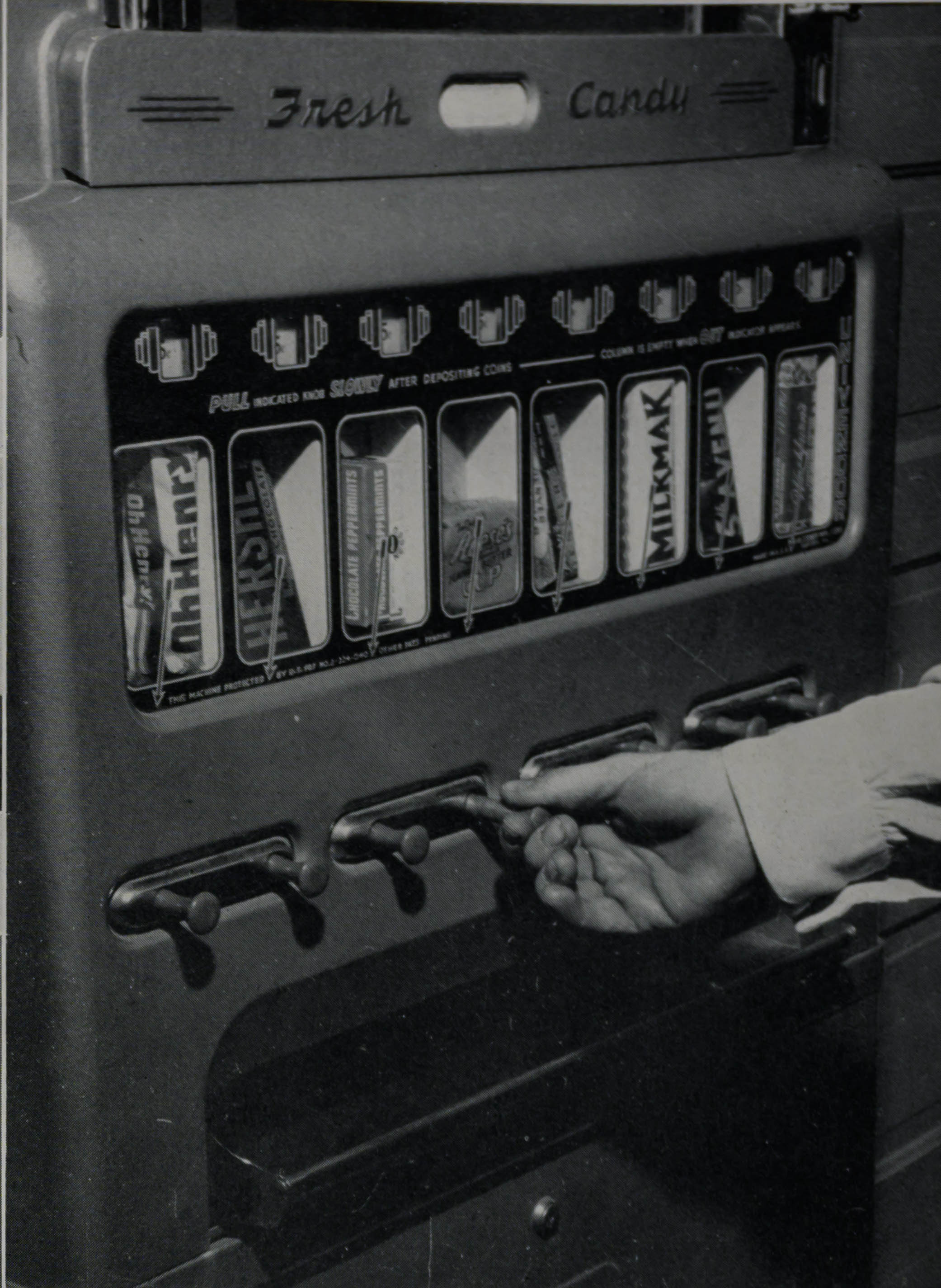 Getting candy out of the vending machine in 1951