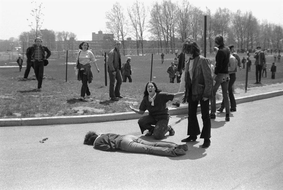 Photo: Mary Ann Vecchio kneeling over the body of Jeffrey Miller