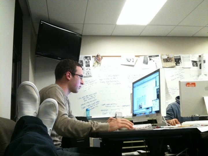 Ben Wolford designing a page in the Stater newsroom