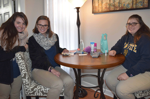 Students shown with a Blessing Bag to be given to clients at the Ava Women’s Center Students shown with a Blessing Bag to be given to clients at the Ava Women’s Center