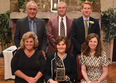 The Bricker family accepted the Community Partner Award, given to Bricker’s Cafeteria and Catering. The Bricker family accepted the Community Partner Award, given to Bricker’s Cafeteria and Catering.