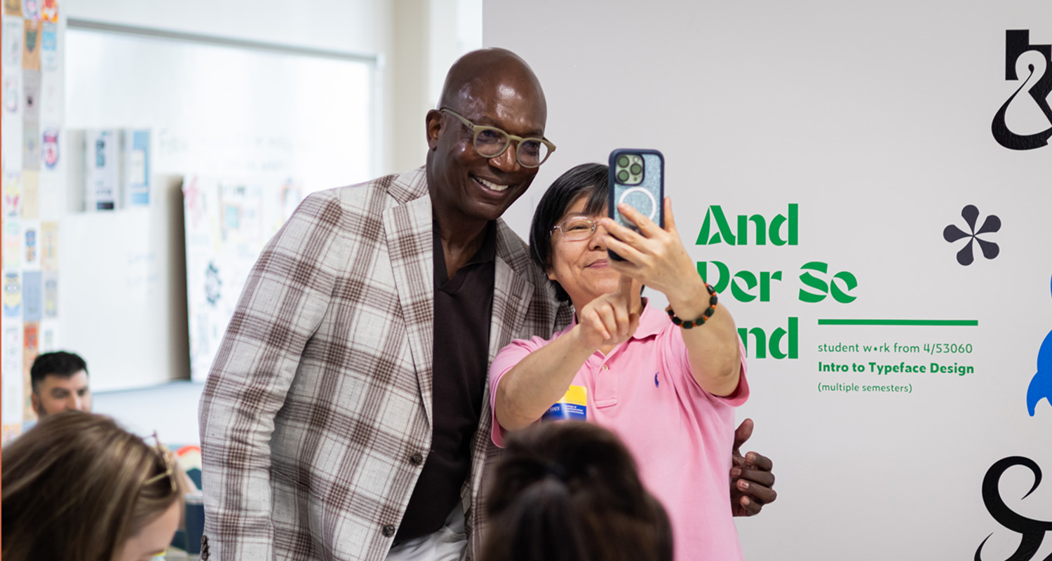 Mike Jackson poses for photo with CTE Day attendee