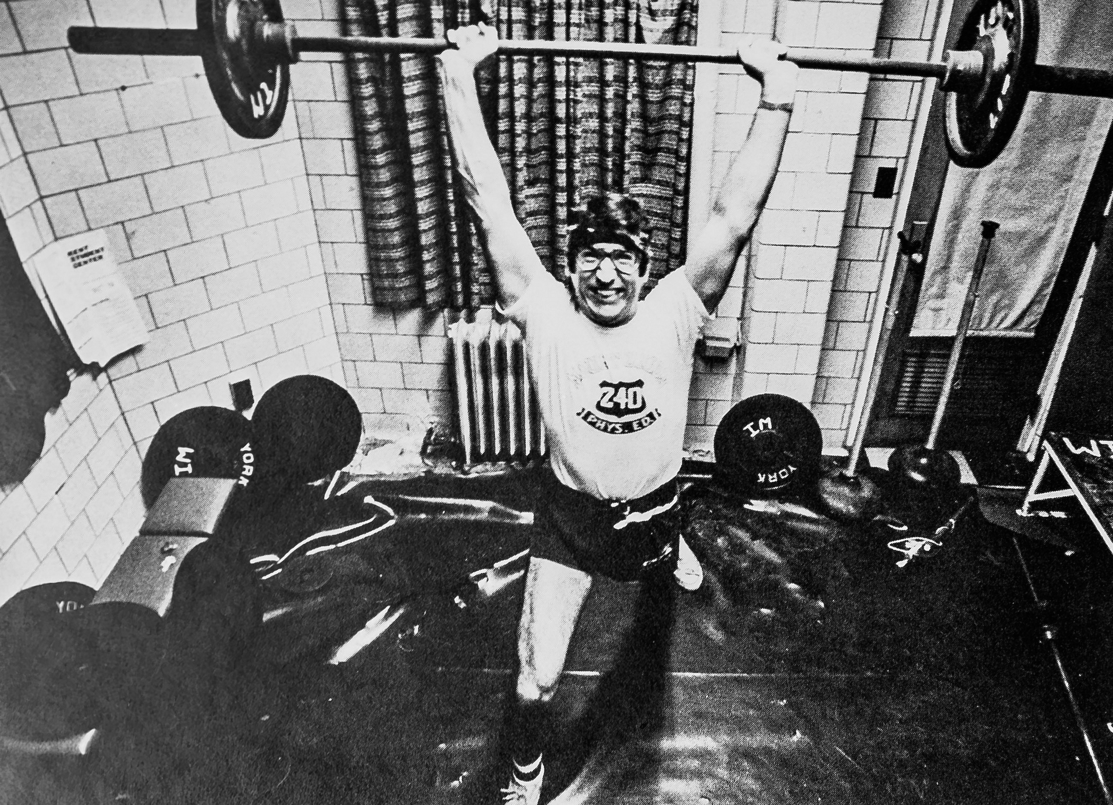 Man lifting weights 1976