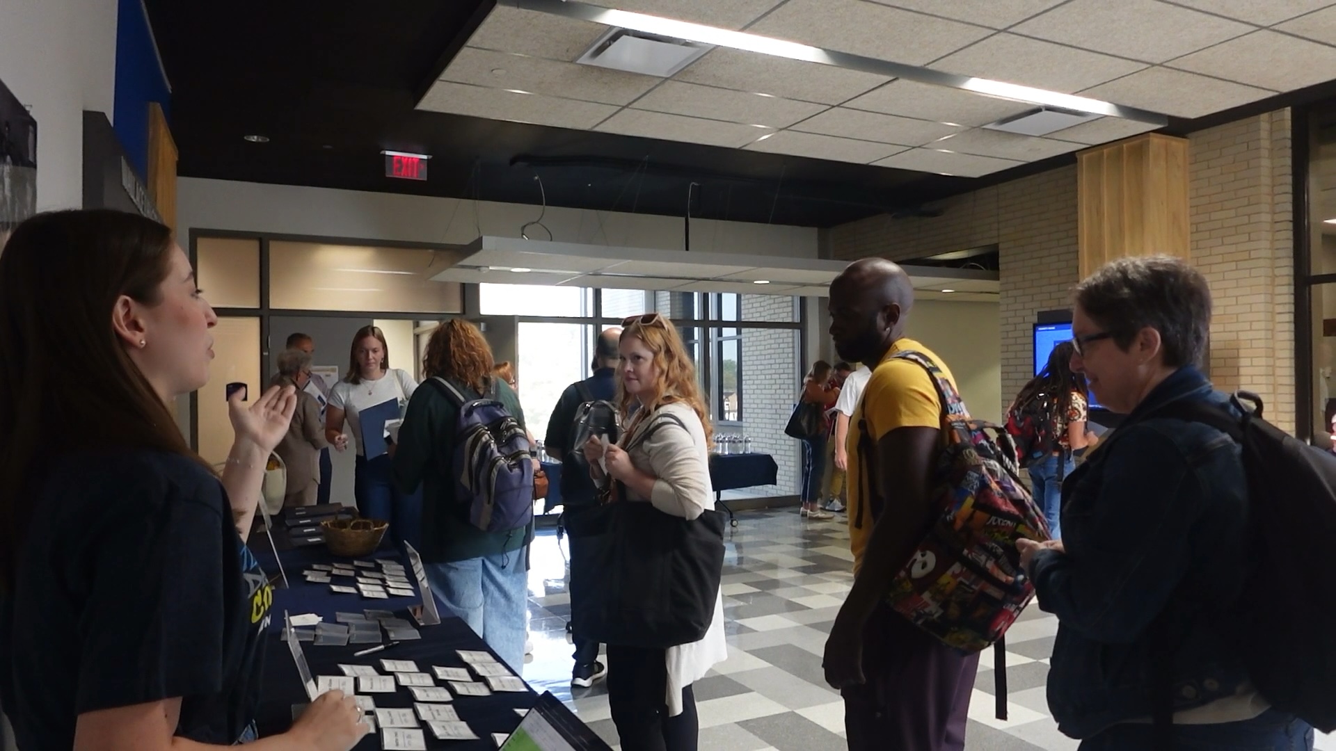 Teachers mingling in lobby of Franklin Hall for CTE Day