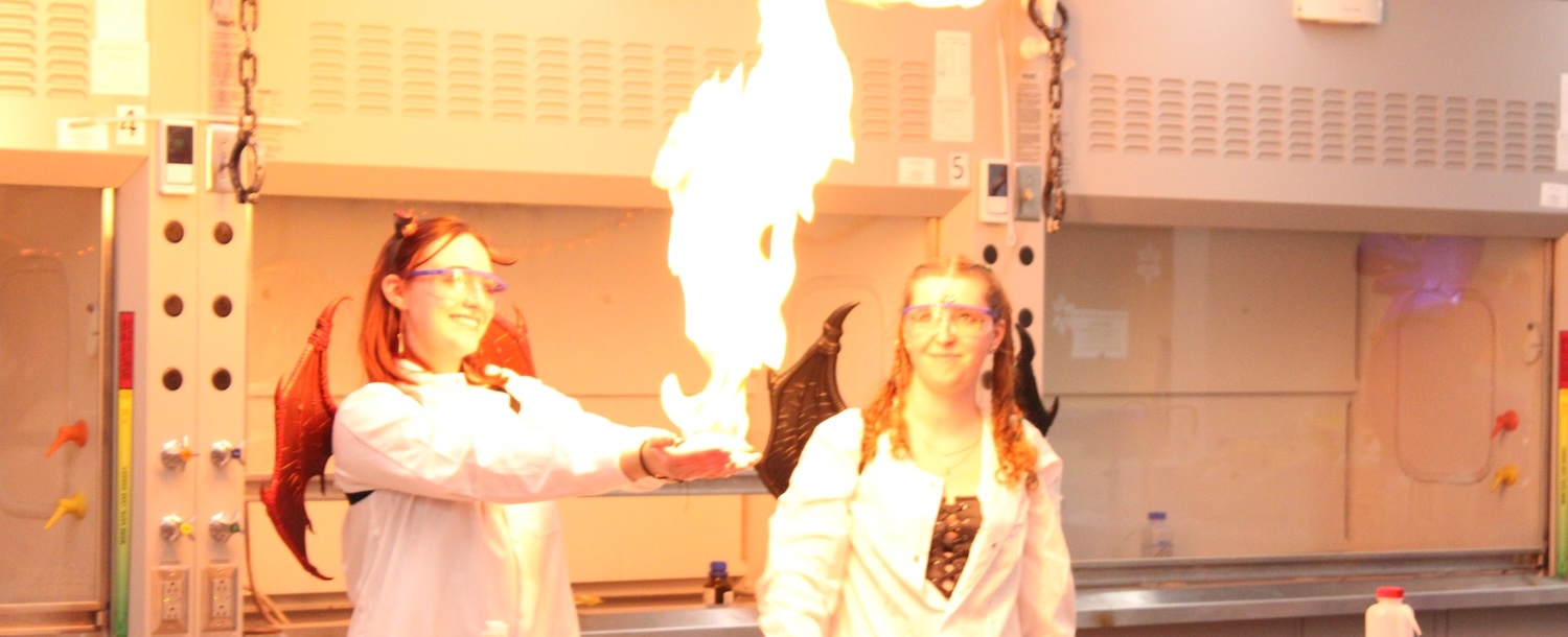 Chem-O-Ween 2025 student's "hand" on fire