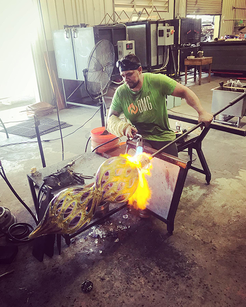 Dan Alexander blowing glass