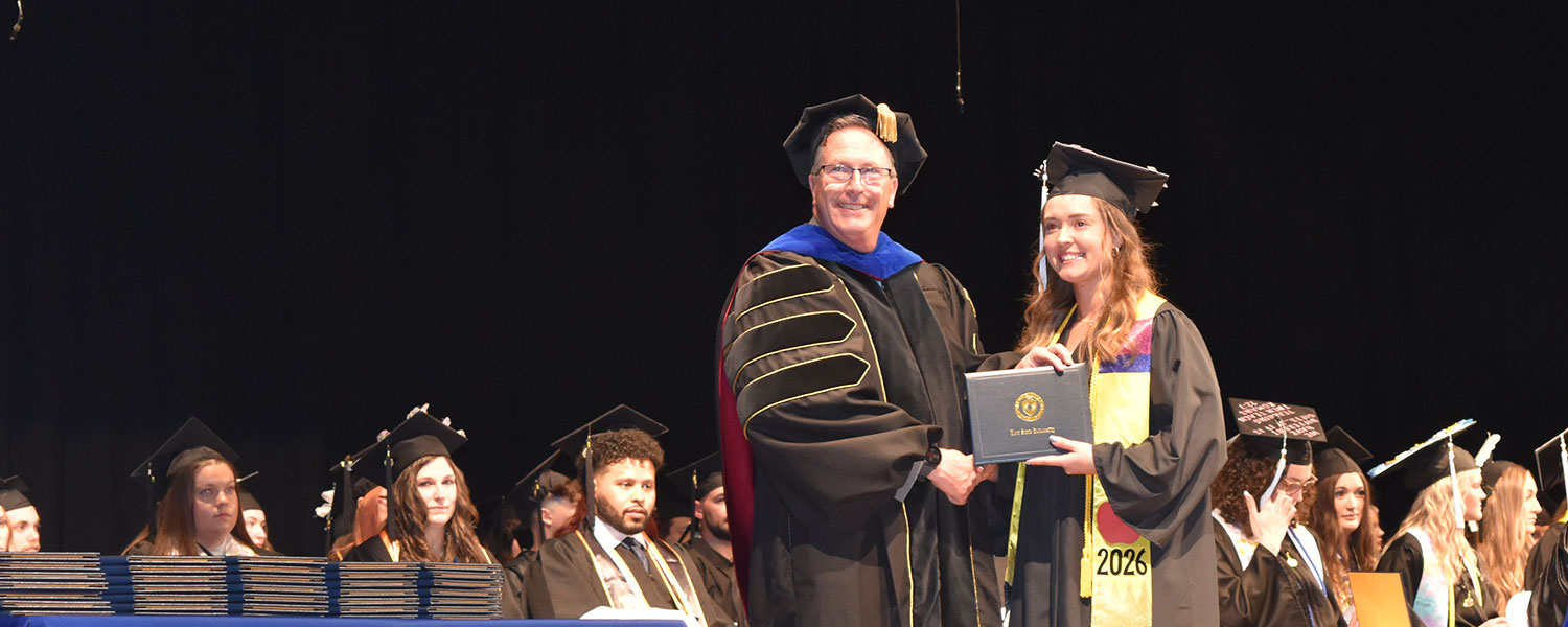 Dean James Hannon presented graduates with their diplomas.