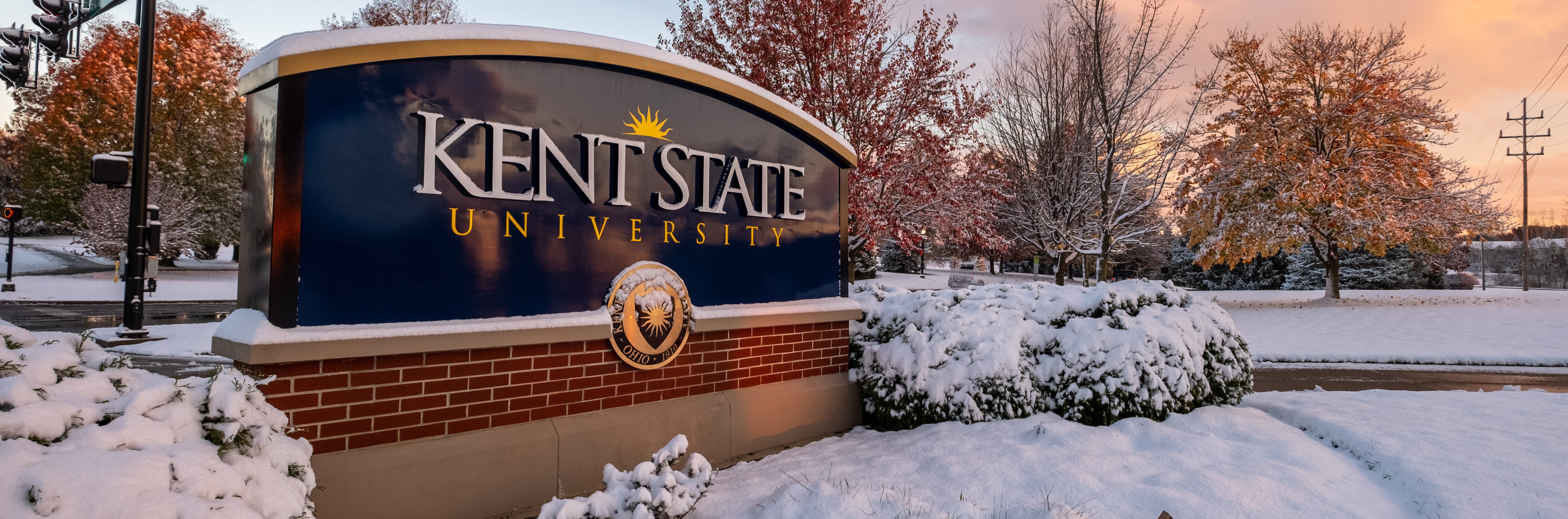 Campus sign in November snow