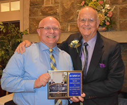 Dr. David Dees, dean, with Frank C. Dawson, accepting the Friend of the Campus Award for James and Keith Locke.