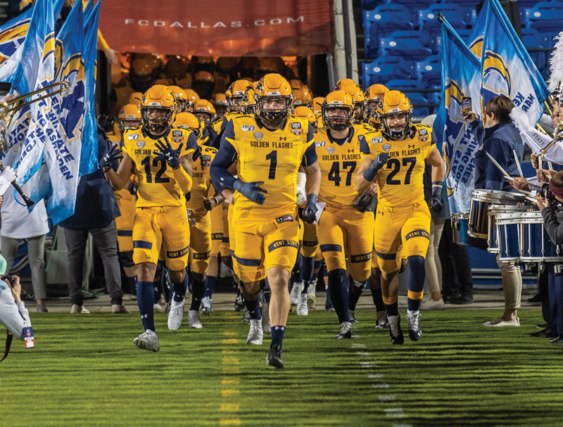 The 鶹ӰԺ State football team running onto the field at the Frisco Bowl. 