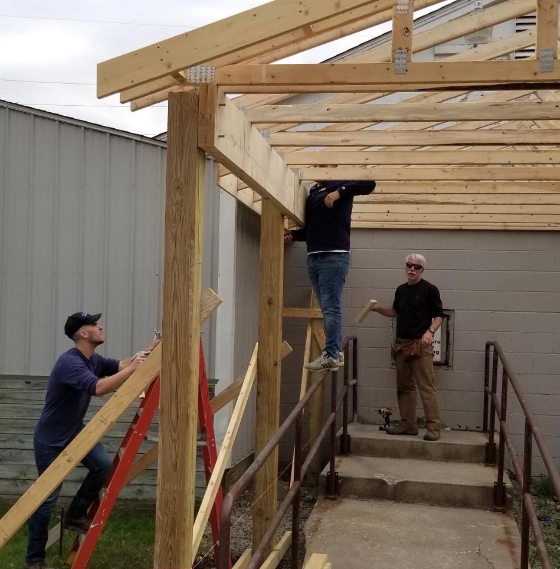 students constructing the shelter