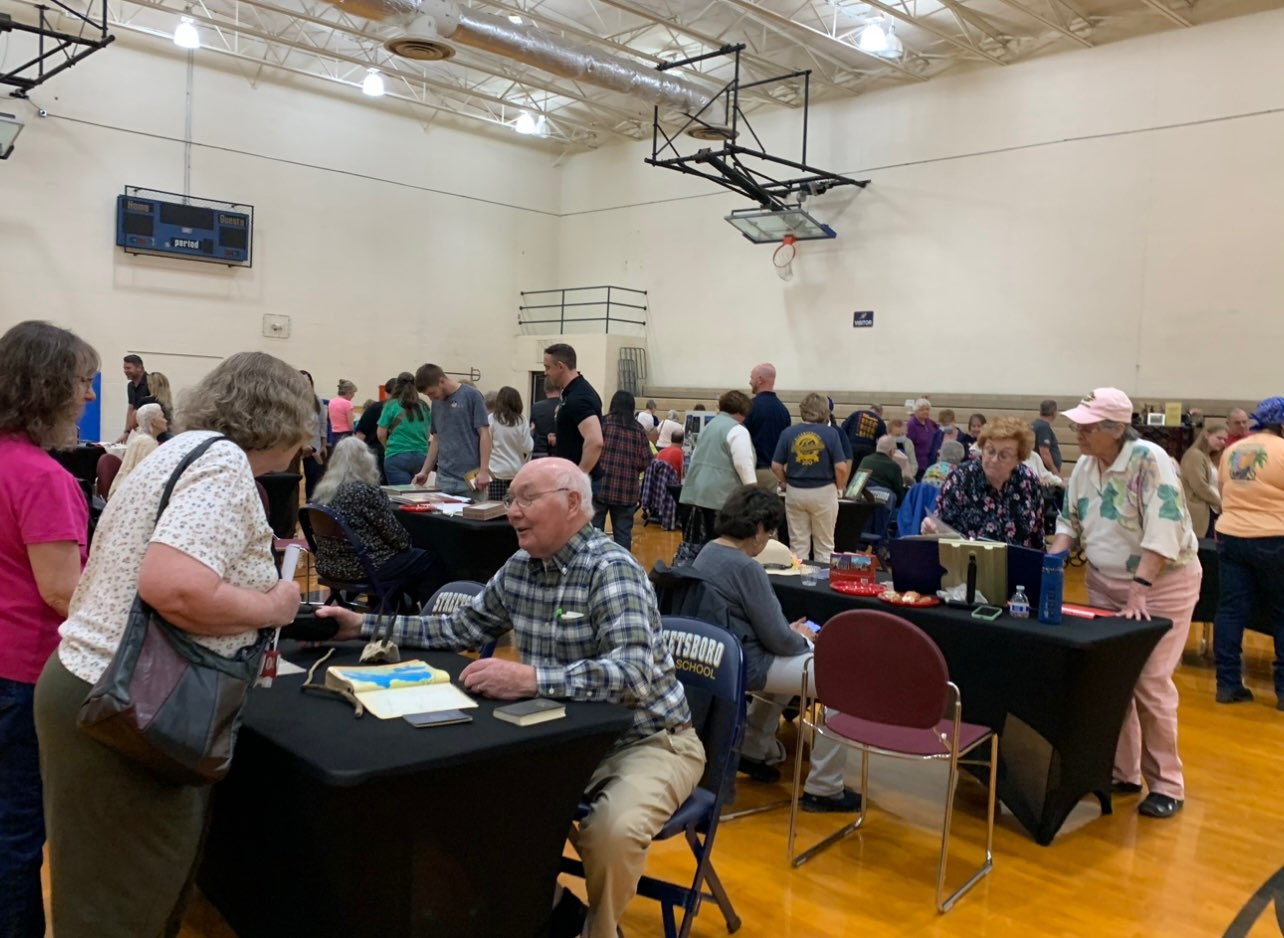 A crowd gathers in the Streetsboro Student Center for a night of stories from community seniors.