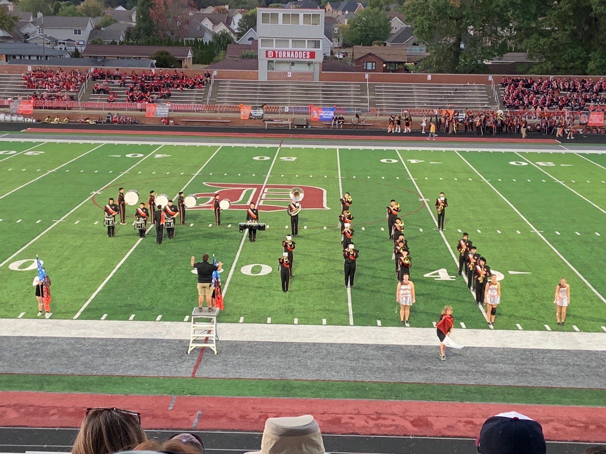 marching band performing on a football field
