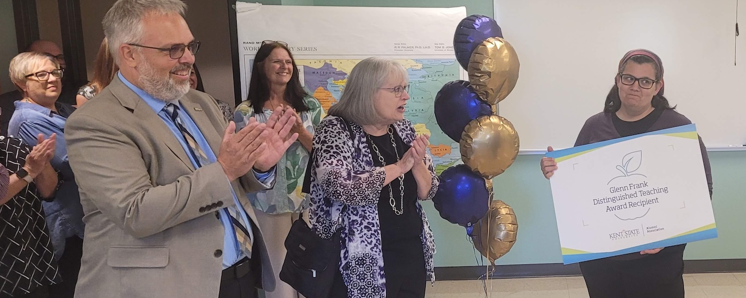 Jessica Leveto, Ph.D., receiving the 2025 Glenn Frank Distinguished Teaching Award