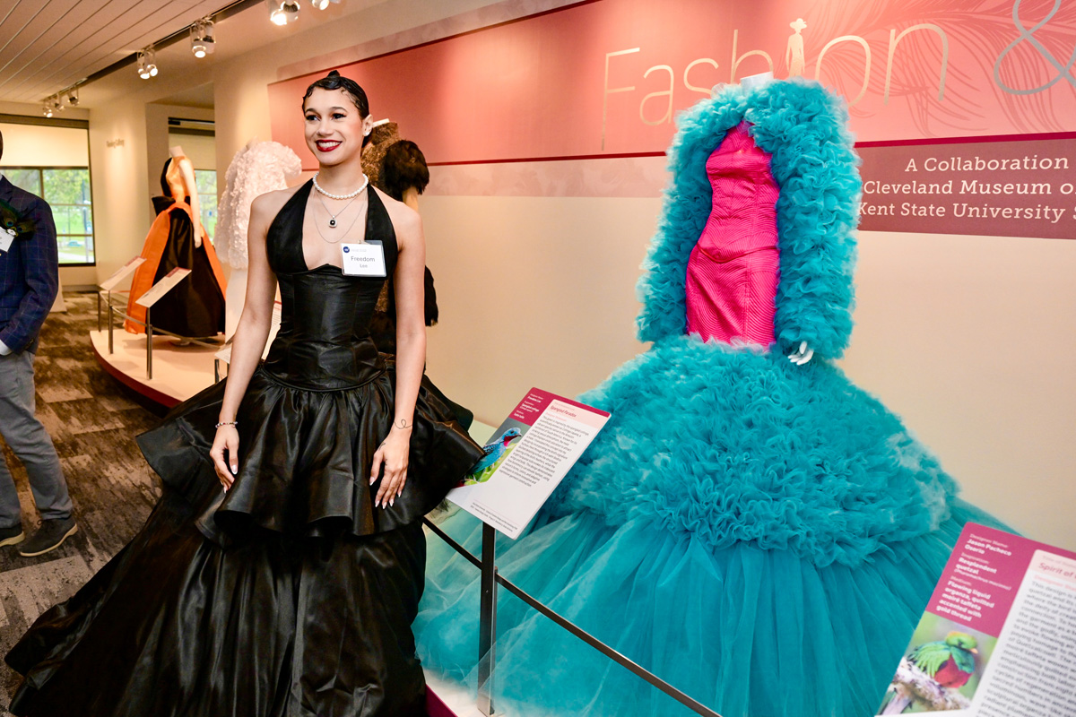 Student with design at Fashion and Feathers