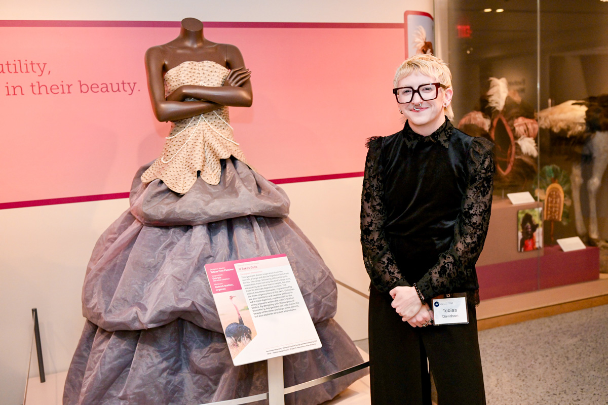 Student with gown at the Cleveland Museum of Natural History
