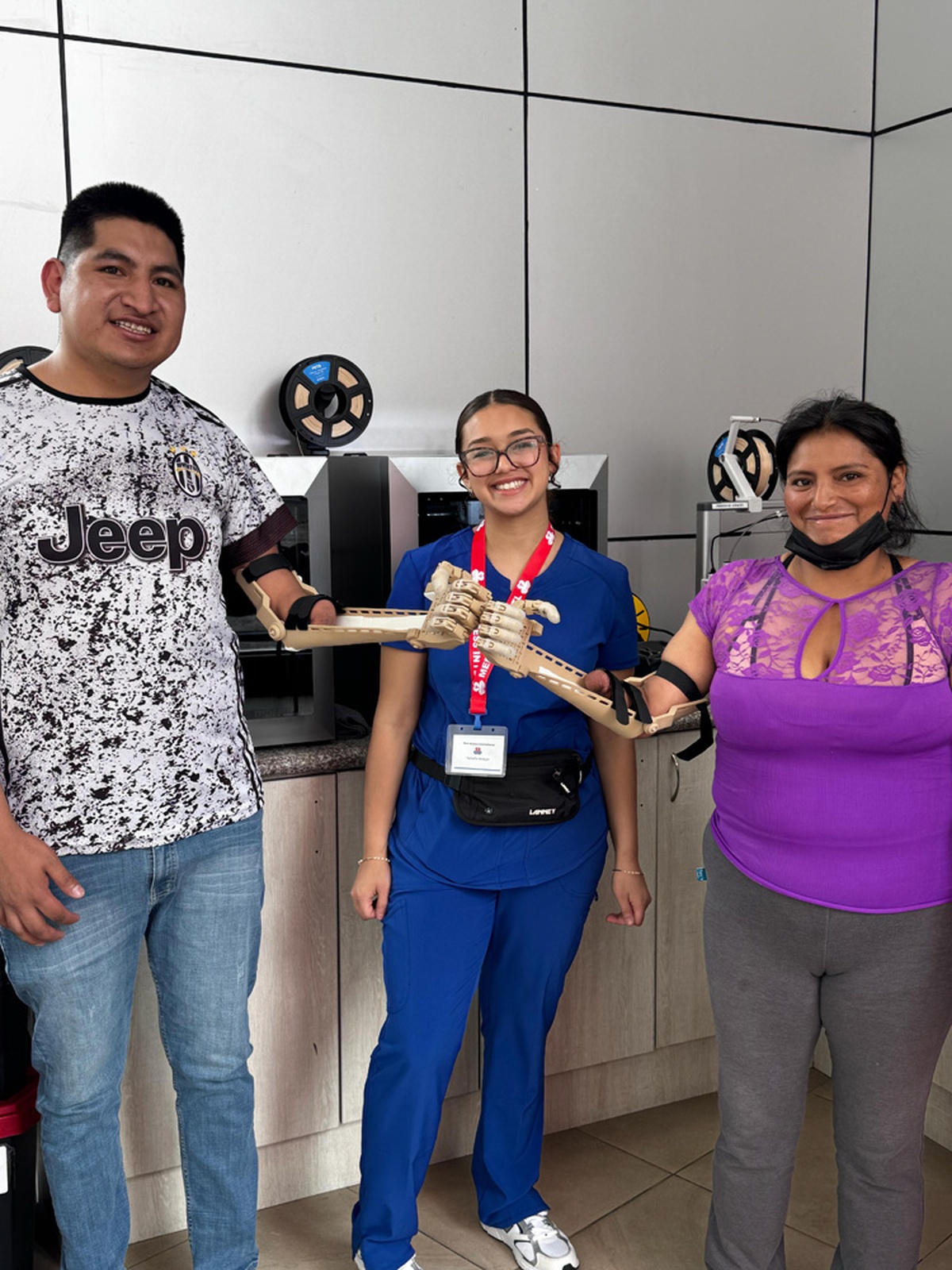 Two patients with new prosthetic hands and Yari