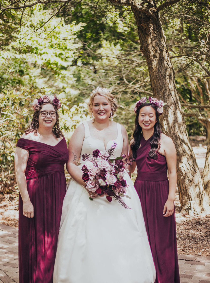 Noelle Blazek with friends at wedding
