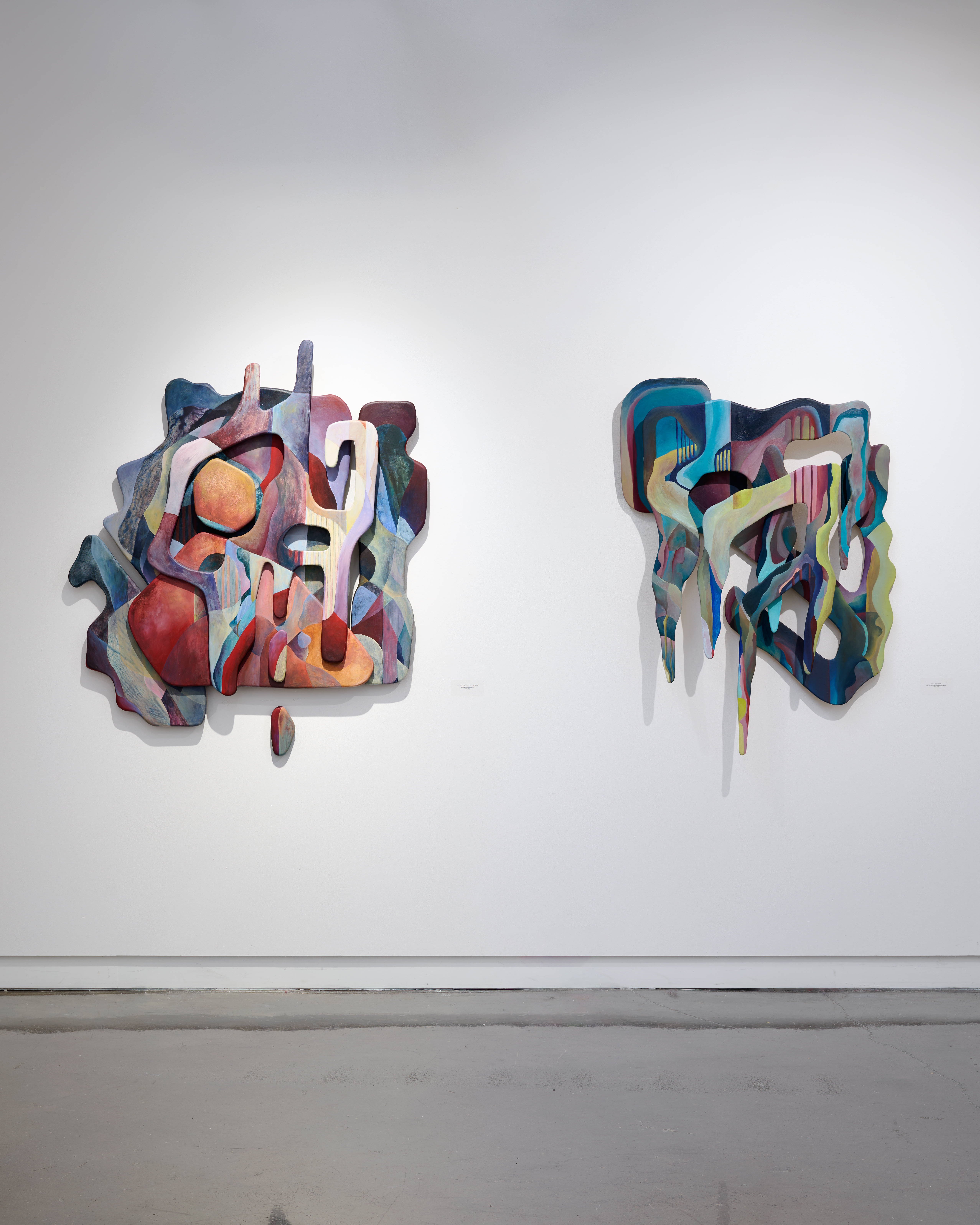 colorful geometric 3d sculptures in the gallery