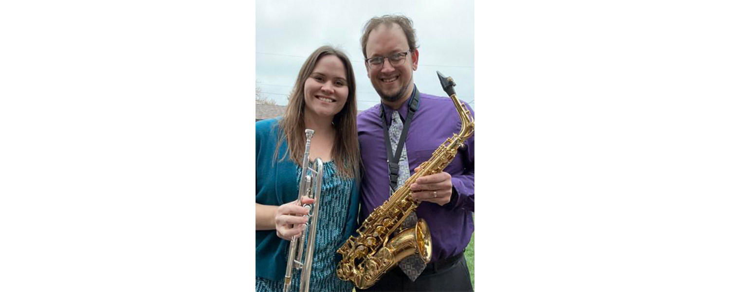 Marie and Ryan Freitas with their instruments