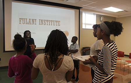 Fulani Institute participants receive instructions for sharing self-composed poems “Africa Is.” (Photo credit: Joy Yala, master’s student and Center of Pan-African Culture staff photographer) Fulani Institute participants receive instructions for sharing self-composed poems “Africa Is.” (Photo credit: Joy Yala, master’s student and Center of Pan-African Culture staff photographer)