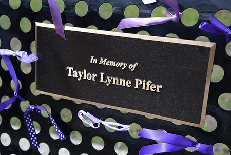 A plaque honors the memory of Kent State University student Taylor Pifer whose life was cut short in June 2017. A plaque honors the memory of Kent State University student Taylor Pifer whose life was cut short in June 2017.