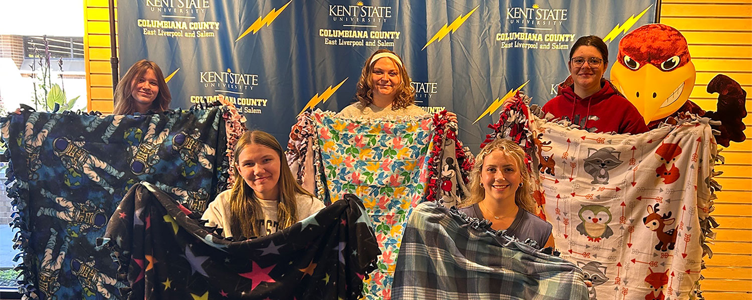 Honors students from Kent State Salem with fleece blankets they made for patients at Akron Children鈥檚 Hospital are (front, from left) Zoey Almy and Haley Hazelbaker; and (back, from left) Katelyn Reinhart, Jennifer Tedrow and Abigail Wolfgang.