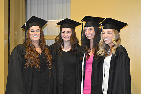OTA students ready to walk across the stage. OTA students ready to walk across the stage.