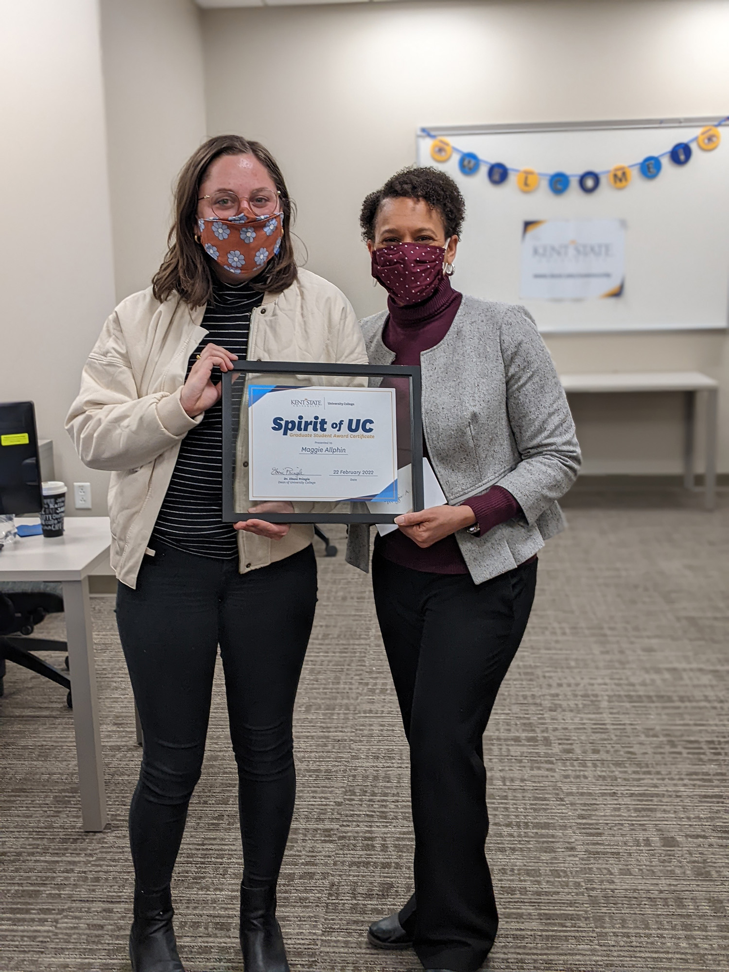 Maggie receiving her award from Dr. Pringle