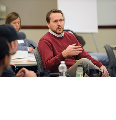 Program Participant Engages in Classroom Discussion