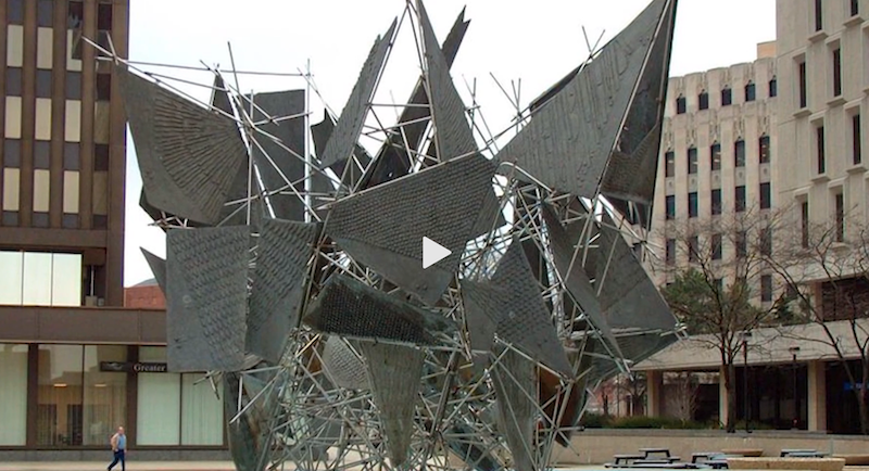 Screenshot from Applause public program of an abstract public sculpture of metal