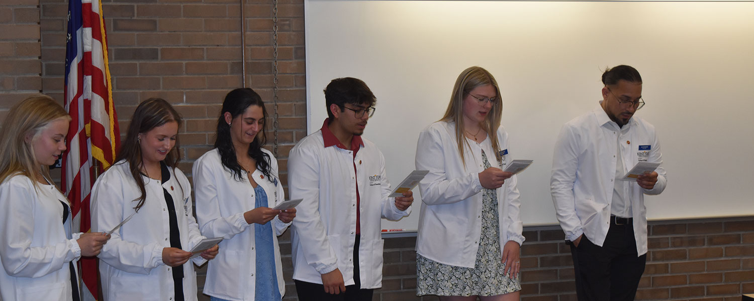 Reciting the student nursing pledge.