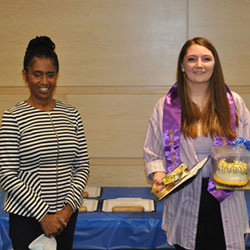 Stephanie Shaw, of the Marion G .Resch Foundation, presents a certificate and gifts to graduate Stephanie Vassar from East Liverpool High School. Stephanie Shaw, of the Marion G .Resch Foundation, presents a certificate and gifts to graduate Stephanie Vassar from East Liverpool High School.
