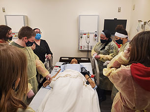 Taking a pulse and checking vitals. Taking a pulse and checking vitals.
