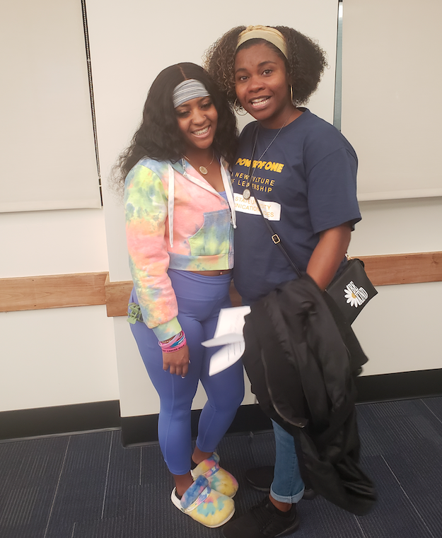 Culler with a student from Firestone High School in Akron Culler with a student from Firestone High School in Akron