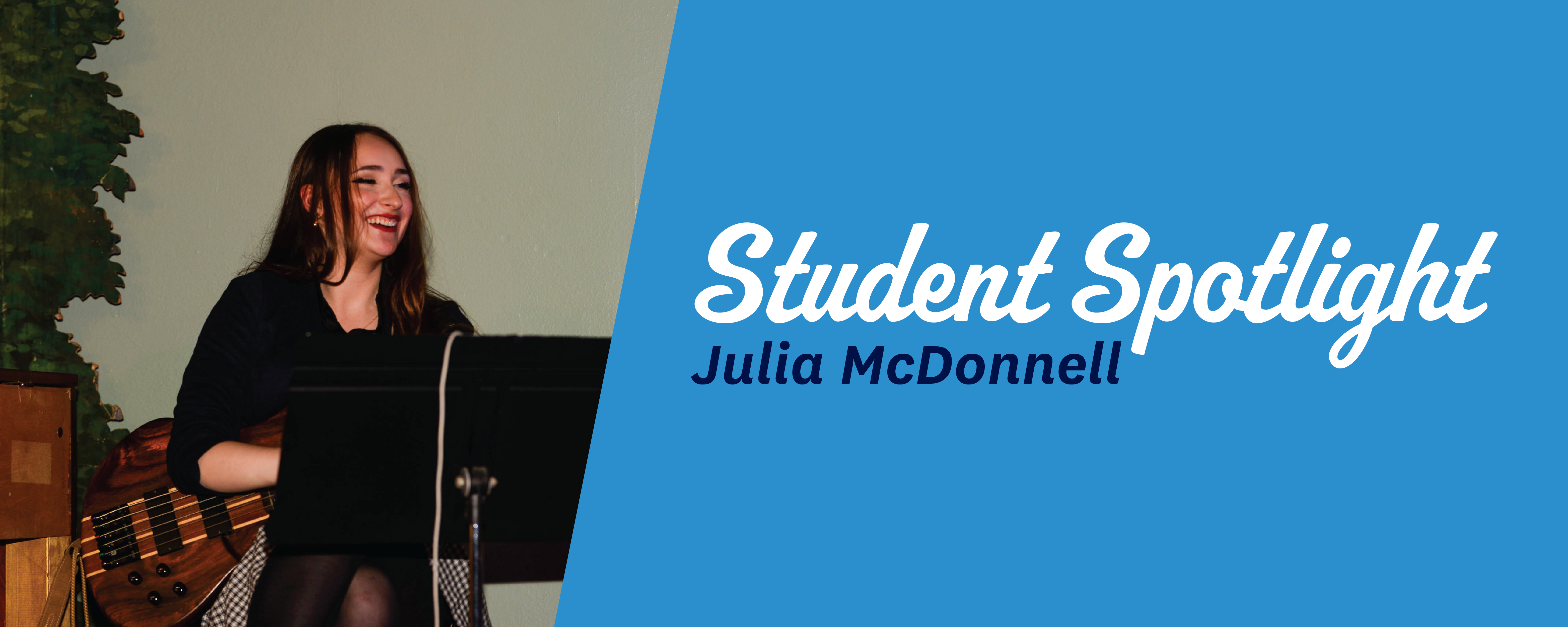 Julia McDonnell smiling and holding an instrument with blue student spotlight graphic to the right of her