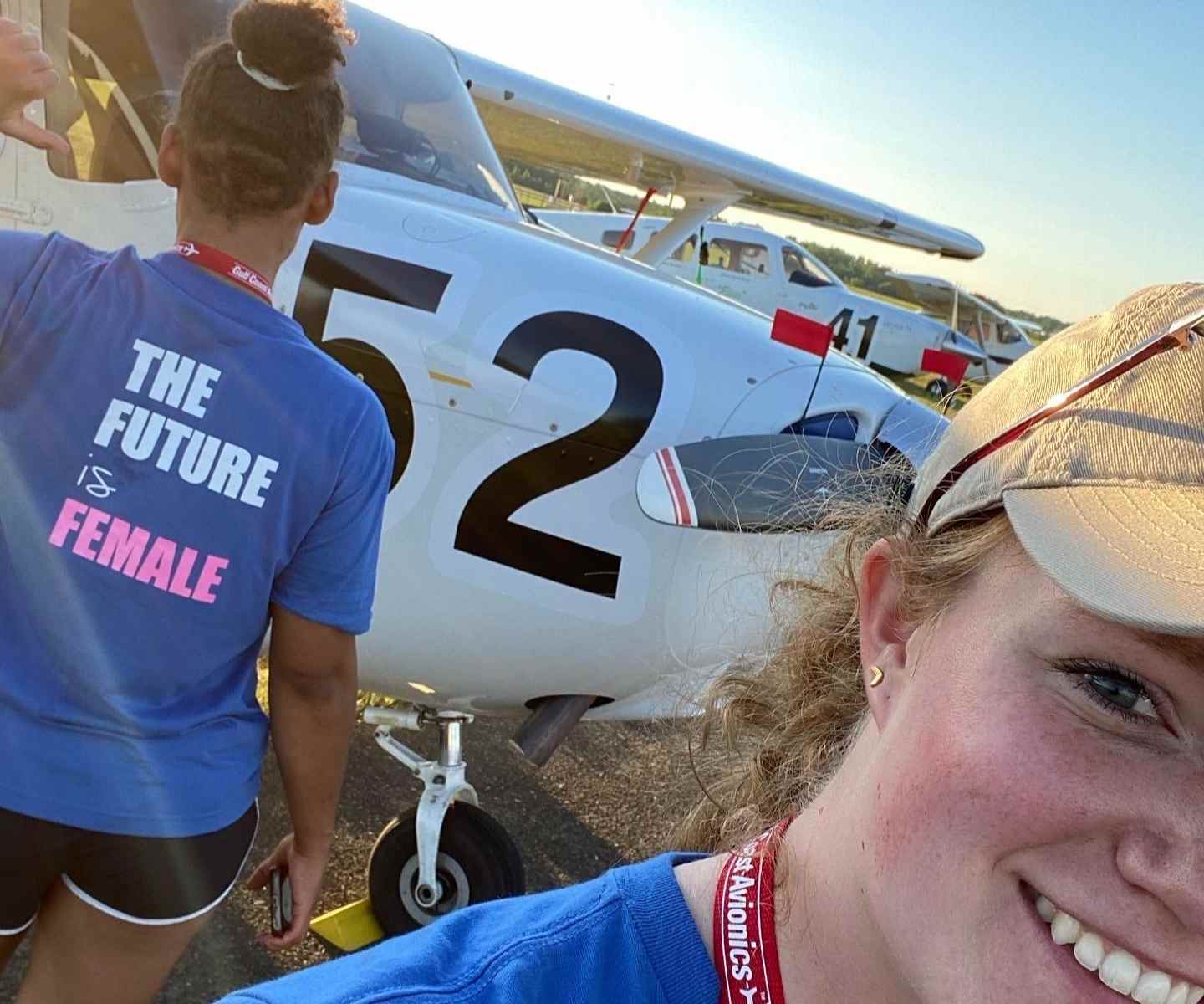 Laura and Alex wearing the Future is Female t-shirts