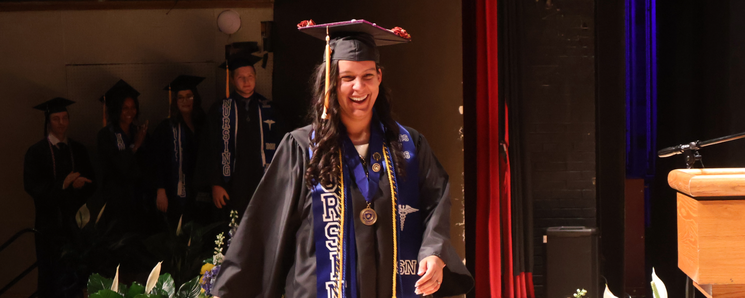 Achante Pascute from Trumbull graduates