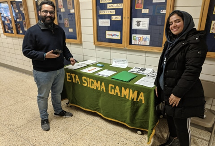 Rho Chapter Members at their booth during an event